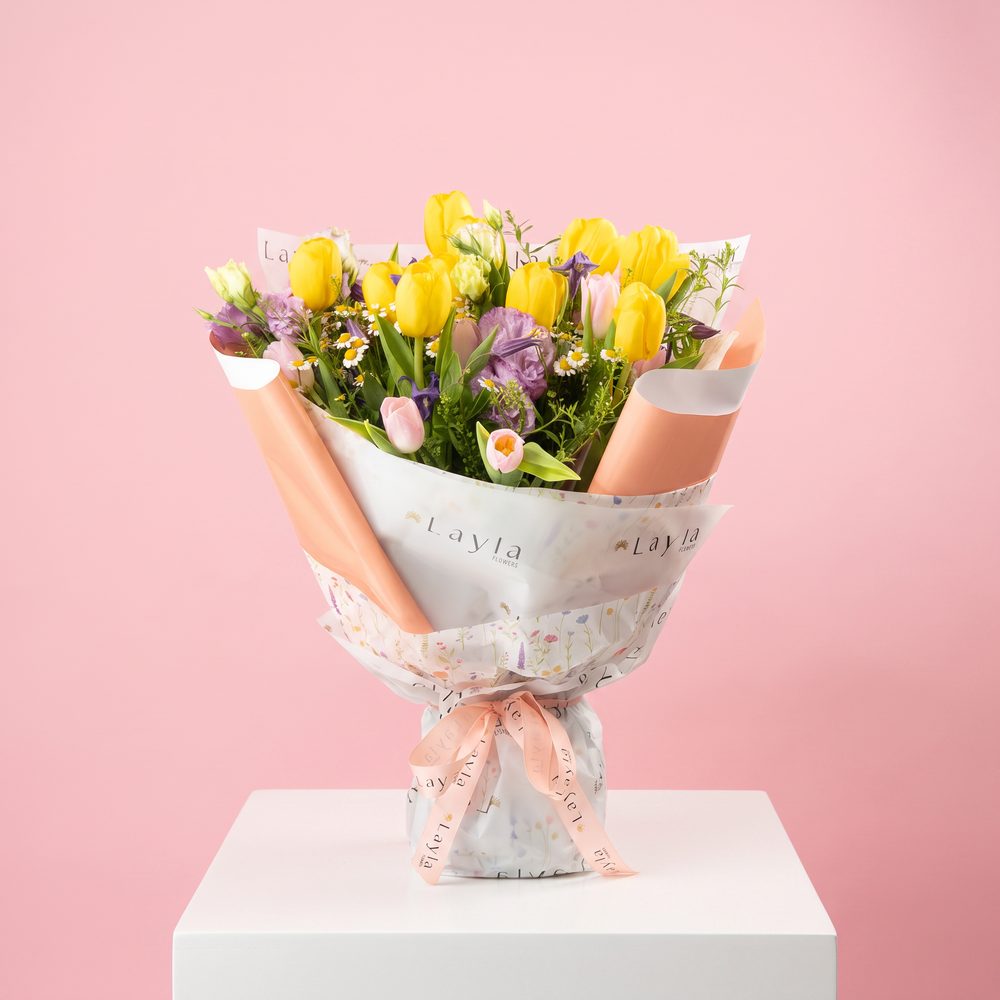 Layla Flowers tulip bouquet in branded wrapping paper and ribbon