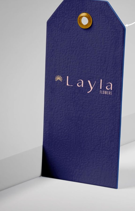 Navy Layla Flowers product tag with gold eyelet