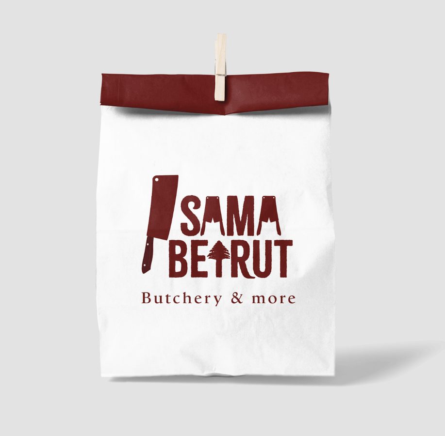 White paper bag with maroon Sama Beirut logo